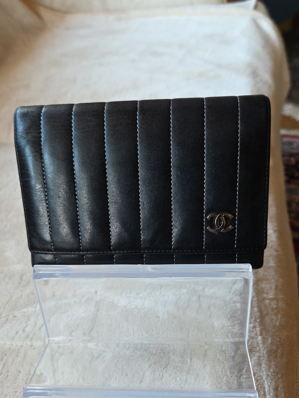CHANEL Mademoiselle Black Vertical Quilted Leather Wallet with Silver CC Emblem